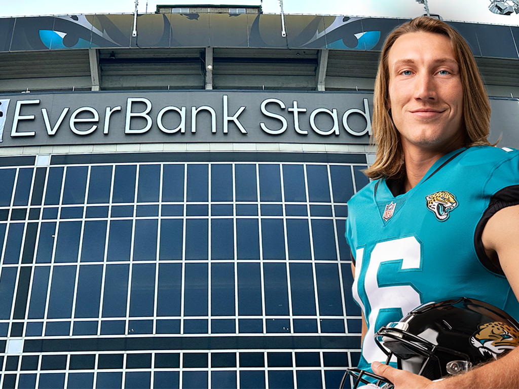 Trevor Lawrence posing in front of the Everbank Standium